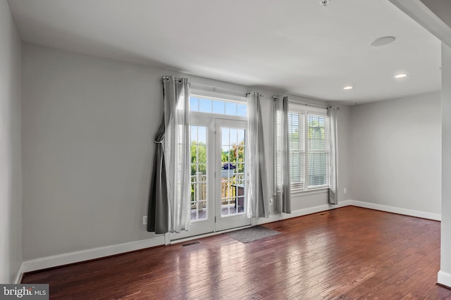 15343 Tewkesbury Pl, Upper Marlboro, MD 20774 - empty room with wood-type flooring, recessed lighting, and baseboards