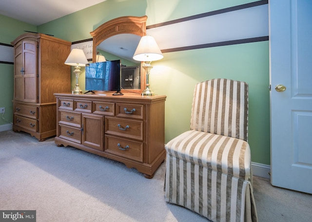 sitting room with light colored carpet