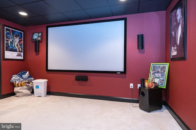 home theater featuring recessed lighting, baseboards, a drop ceiling, and carpet floors