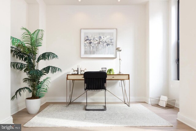office area featuring wood finished floors, baseboards, and recessed lighting
