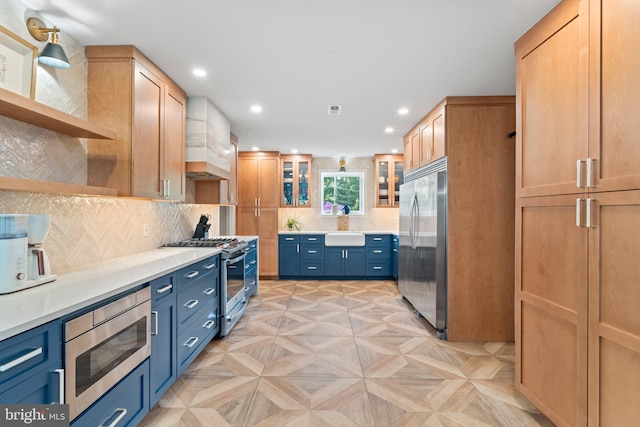 kitchen with open shelves, a sink, built in appliances, premium range hood, and recessed lighting