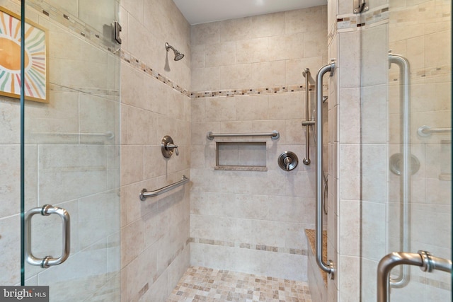 full bathroom featuring a shower stall