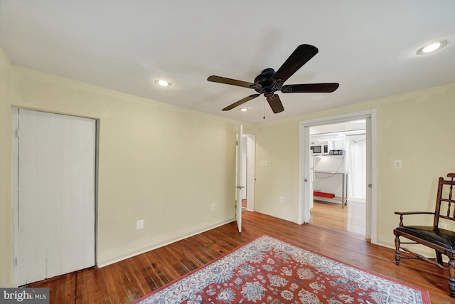 415 Schwartz Ave, Baltimore, MD 21212 - living area featuring wood finished floors, ceiling fan, and recessed lighting