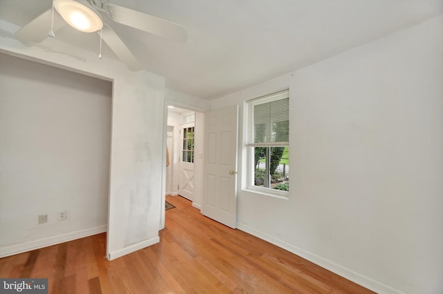 415 Schwartz Ave, Baltimore, MD 21212 - unfurnished bedroom featuring baseboards, wood finished floors, and a ceiling fan