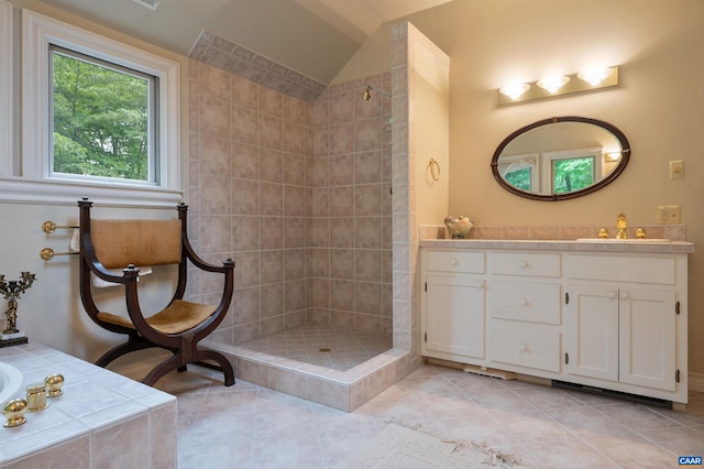 481 Stoney Creek E, Nellysford, VA 22958 - full bath featuring a bathing tub, tiled shower, vanity, lofted ceiling, and tile patterned flooring