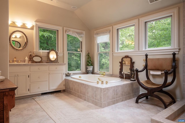481 Stoney Creek E, Nellysford, VA 22958 - bathroom with tile patterned floors, vanity, lofted ceiling, and a bath