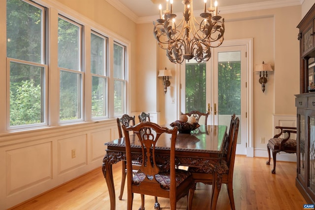 481 Stoney Creek E, Nellysford, VA 22958 - dining space with ornamental molding, light wood-type flooring, and a notable chandelier