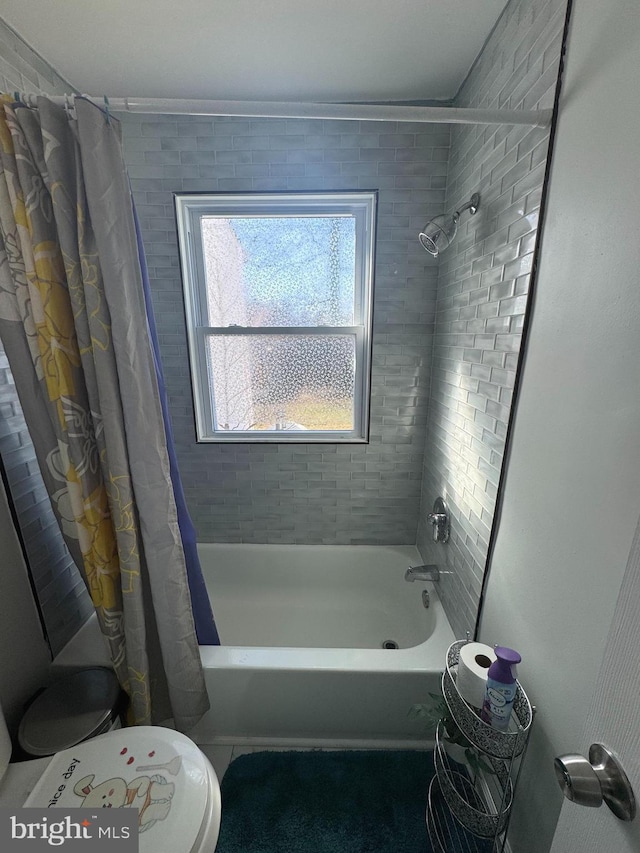 3207 Randall Rd, Suitland, MD 20746 - bathroom featuring toilet and shower / bathtub combination with curtain