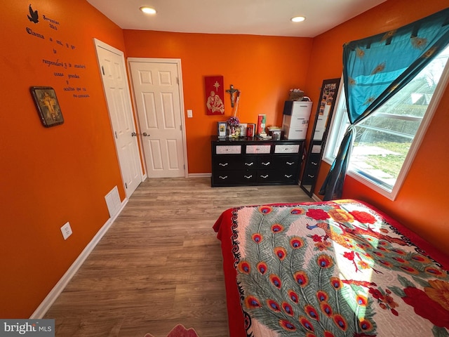 3207 Randall Rd, Suitland, MD 20746 - bedroom with baseboards, recessed lighting, wood finished floors, and visible vents