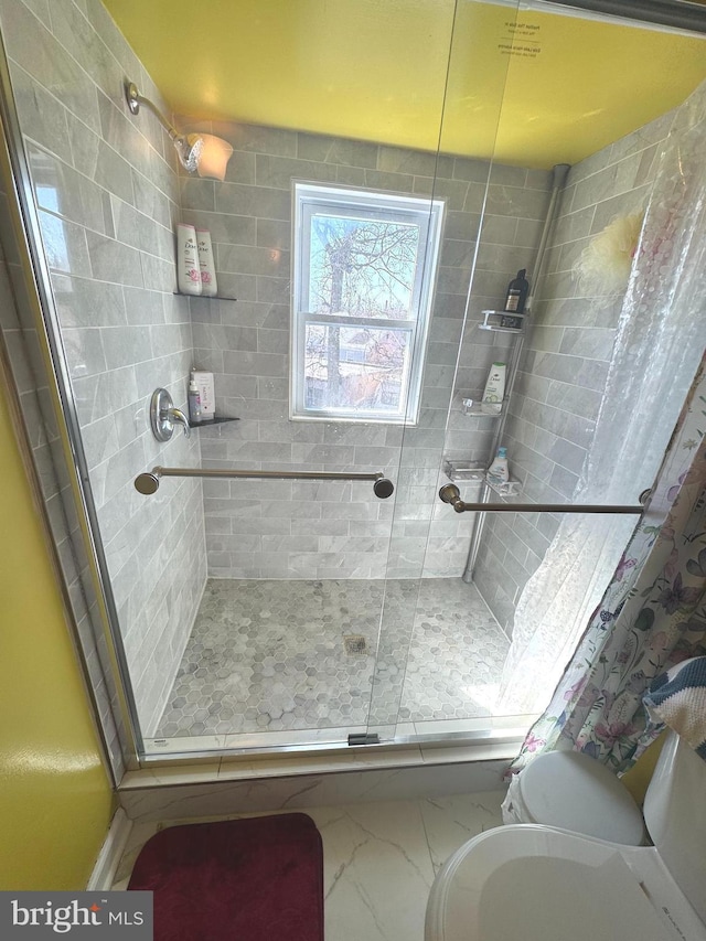 3207 Randall Rd, Suitland, MD 20746 - bathroom featuring a stall shower, toilet, and marble finish floor