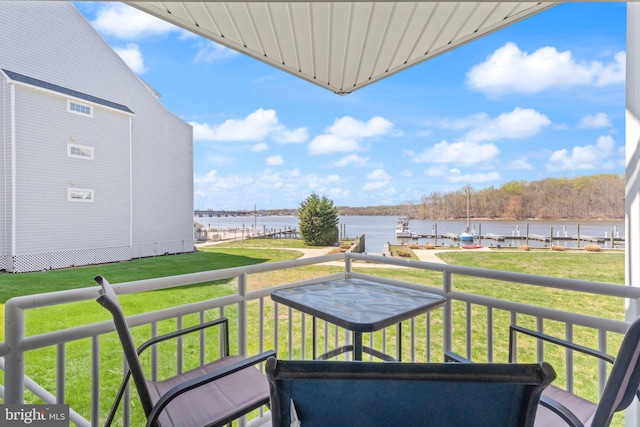 balcony featuring a water view