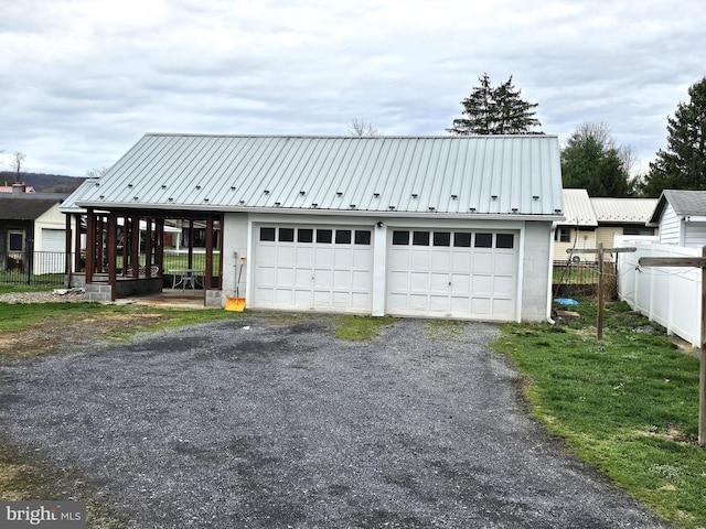 detached garage with fence