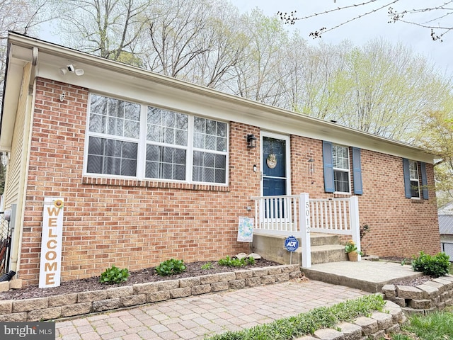 single story home with brick siding