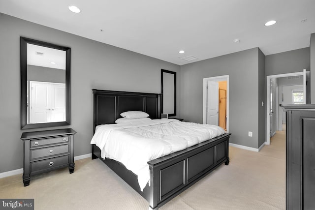 bedroom featuring recessed lighting, light carpet, visible vents, and baseboards