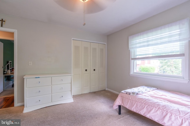 3305 Baker Ct, Altoona, PA 16602 - bedroom with light colored carpet, a closet, baseboards, and a ceiling fan