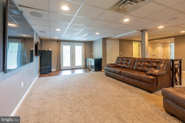 3305 Baker Ct, Altoona, PA 16602 - carpeted living room with french doors, baseboards, plenty of natural light, a paneled ceiling, and recessed lighting