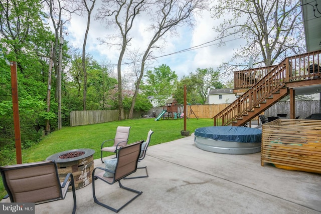 3305 Baker Ct, Altoona, PA 16602 - view of patio featuring a fire pit, stairway, a playground, and a deck