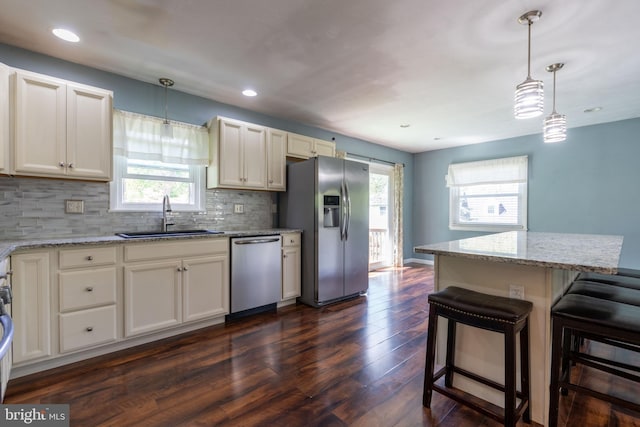 3305 Baker Ct, Altoona, PA 16602 - kitchen with appliances with stainless steel finishes, a sink, dark wood-style floors, healthy amount of natural light, and recessed lighting