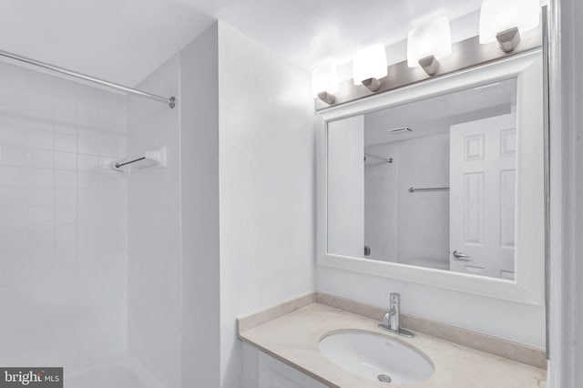 full bath featuring vanity