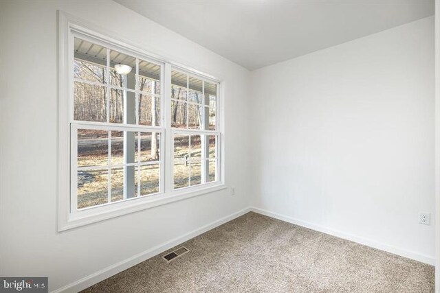 LOT4 Saint George St, Berkeley Springs, WV 25411 - spare room with baseboards, visible vents, and carpet