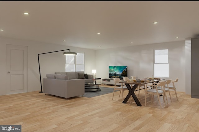 living room featuring light wood finished floors and recessed lighting