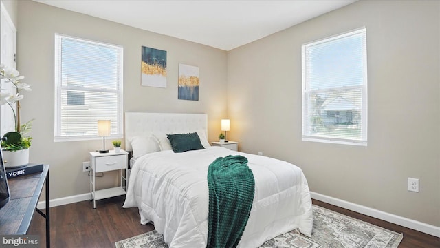 5427 Gradin Ave, Gwynn Oak, MD 21207 - bedroom with wood finished floors and baseboards