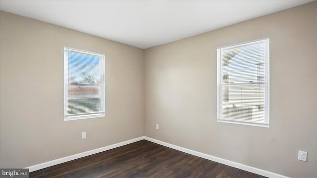 5427 Gradin Ave, Gwynn Oak, MD 21207 - unfurnished room featuring dark wood-style flooring and baseboards