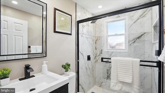 5427 Gradin Ave, Gwynn Oak, MD 21207 - bathroom with recessed lighting, toilet, vanity, and a marble finish shower