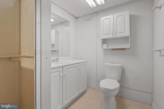 2418 Berkshire Ln, Dover, PA 17315 - bathroom featuring vanity, wood finished floors, and toilet
