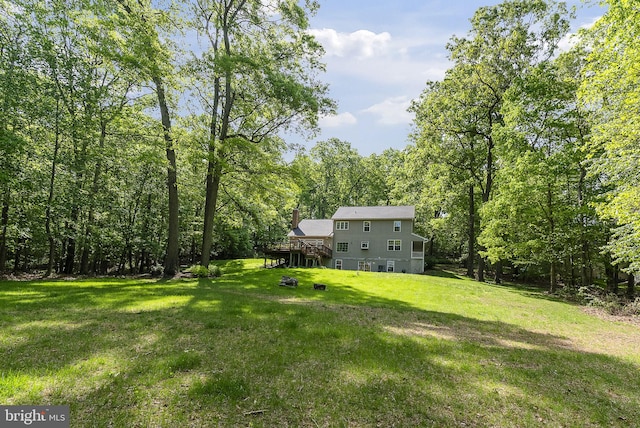 117 Graystone Farm Rd, White Hall, MD 21161 - view of green lawn featuring a forest view and a wooden deck