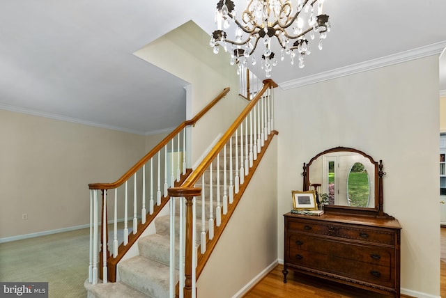 117 Graystone Farm Rd, White Hall, MD 21161 - staircase featuring crown molding, a chandelier, and baseboards
