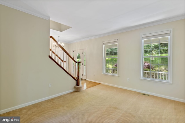 117 Graystone Farm Rd, White Hall, MD 21161 - unfurnished living room featuring carpet flooring, stairway, baseboards, ornamental molding, and a chandelier