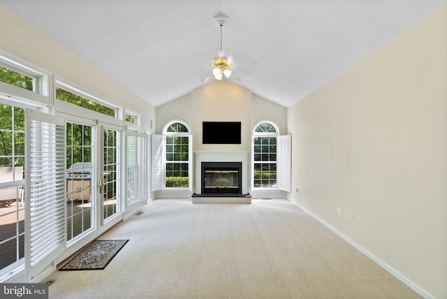 117 Graystone Farm Rd, White Hall, MD 21161 - unfurnished living room with carpet, a ceiling fan, a glass covered fireplace, baseboards, and high vaulted ceiling