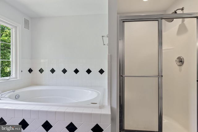 117 Graystone Farm Rd, White Hall, MD 21161 - full bath featuring plenty of natural light, a garden tub, and a shower stall