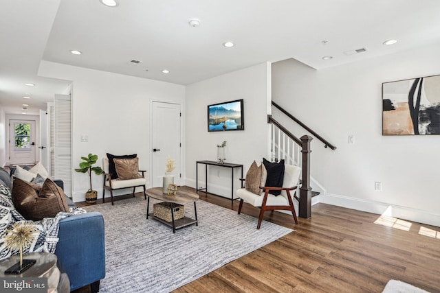322 56th St NE, Washington, DC 20019 - living area featuring stairs, recessed lighting, visible vents, and wood finished floors