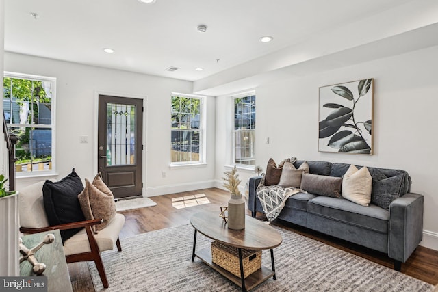 322 56th St NE, Washington, DC 20019 - living area with wood finished floors, baseboards, and recessed lighting