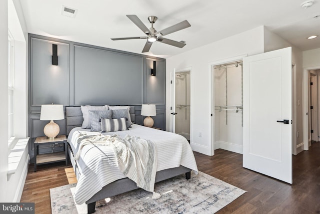 322 56th St NE, Washington, DC 20019 - bedroom featuring visible vents, wood finished floors, baseboards, and ceiling fan