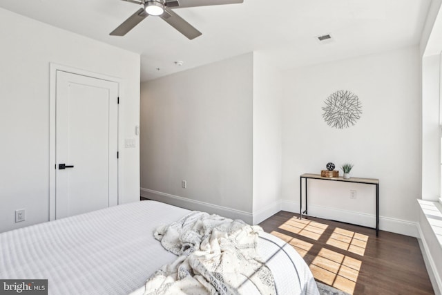 322 56th St NE, Washington, DC 20019 - bedroom with baseboards, a ceiling fan, and wood finished floors