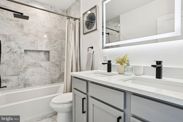 322 56th St NE, Washington, DC 20019 - bathroom featuring toilet, shower / bath combo with shower curtain, a sink, and double vanity
