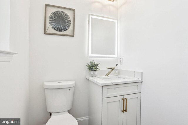 322 56th St NE, Washington, DC 20019 - bathroom featuring vanity and toilet