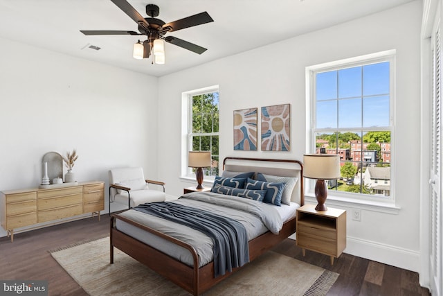 322 56th St NE, Washington, DC 20019 - bedroom featuring baseboards, ceiling fan, visible vents, and wood finished floors