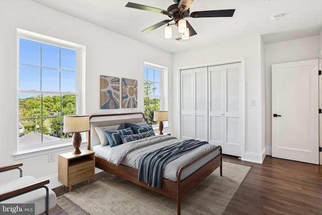 322 56th St NE, Washington, DC 20019 - bedroom with ceiling fan, baseboards, a closet, and wood finished floors