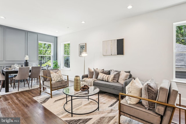 322 56th St NE, Washington, DC 20019 - living room with a healthy amount of sunlight, recessed lighting, and wood finished floors