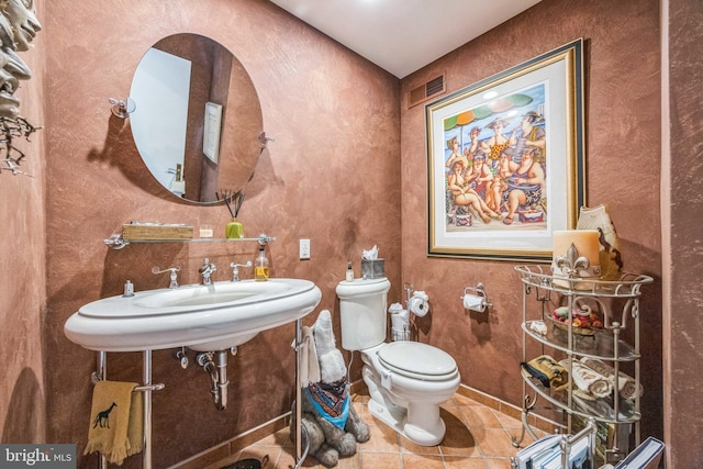 745 Germantown Pike, Lafayette Hill, PA 19444 - bathroom with toilet, tile patterned flooring, and a sink
