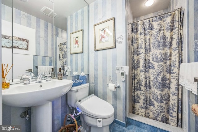 745 Germantown Pike, Lafayette Hill, PA 19444 - full bath featuring wallpapered walls, toilet, tile patterned flooring, a shower with shower curtain, and a sink
