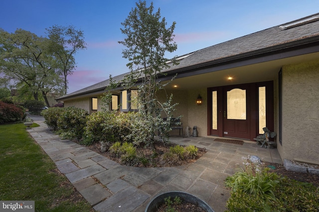 745 Germantown Pike, Lafayette Hill, PA 19444 - exterior entry at dusk featuring stucco siding
