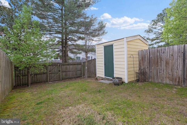 view of shed with a fenced backyard