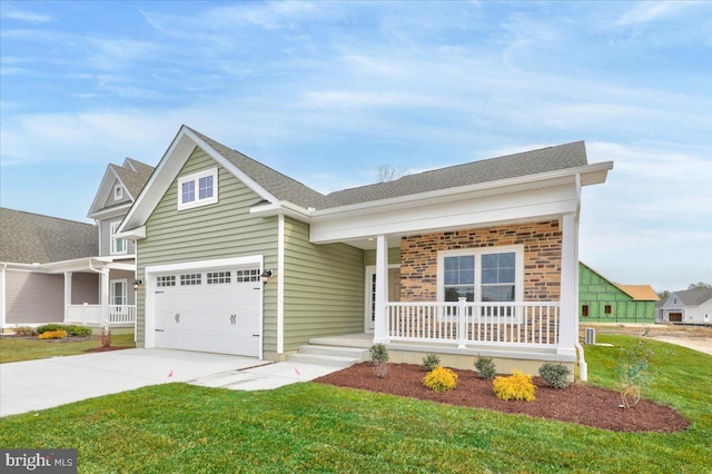 12524 Salisbury Rd, Ocean City, MD 21842 - craftsman-style house featuring a garage, covered porch, a front yard, and concrete driveway
