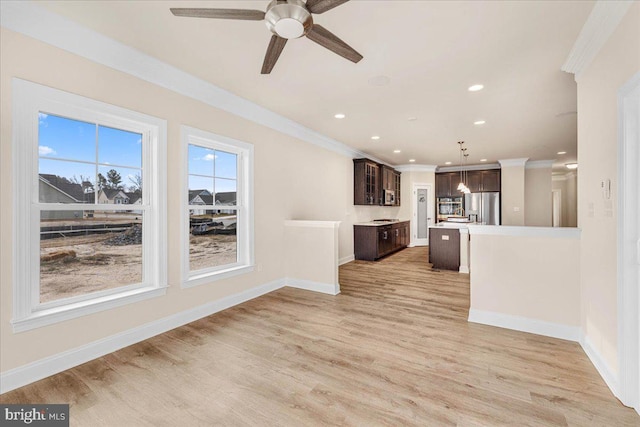 12524 Salisbury Rd, Ocean City, MD 21842 - unfurnished living room with light wood-type flooring, ornamental molding, recessed lighting, and ceiling fan