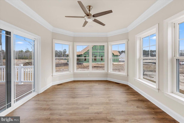 12524 Salisbury Rd, Ocean City, MD 21842 - unfurnished sunroom with wood finished floors, visible vents, crown molding, and baseboards